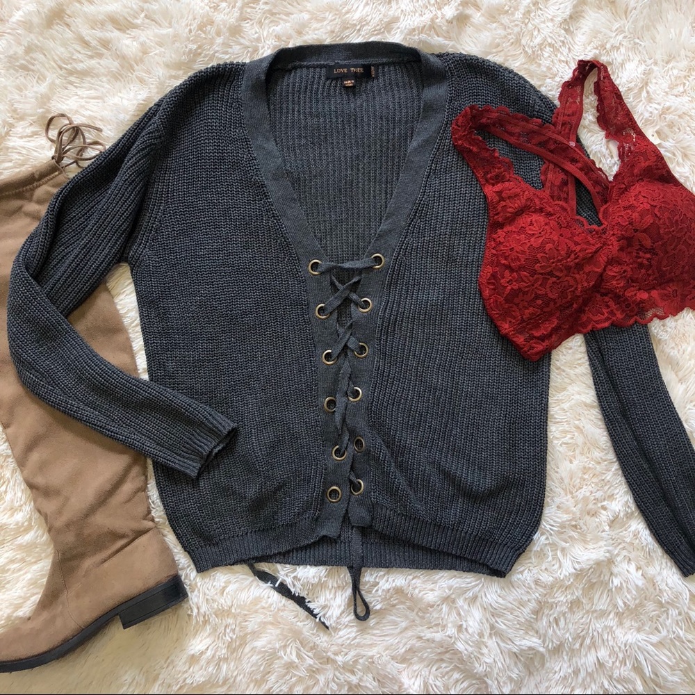 Gray lace up sweater.